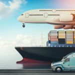 An airplane flying above a cargo ship with shipping containers, while on the ground a light blue semi truck drives next to the ship to illustrate the fundamentals of supply chain.