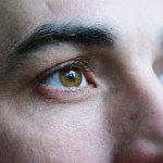 Closeup of a man looking away from the camera.