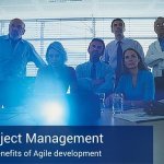 A poster that says "agile project management" with a group of coworkers watching a projection screen.