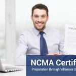 Man wearing a button up shirt and tie smiling, holding up his newly earned NCMA Certification.