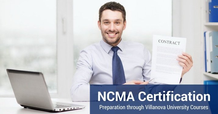 Man wearing a button up shirt and tie smiling, holding up his newly earned NCMA Certification.