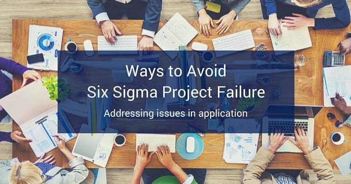 A table full of people sitting around it with office supplies, computers, and coffee scattered around the table with a blue banner at the bottom of the image that reads "Ways to Avoid Six Sigma Project Failure".