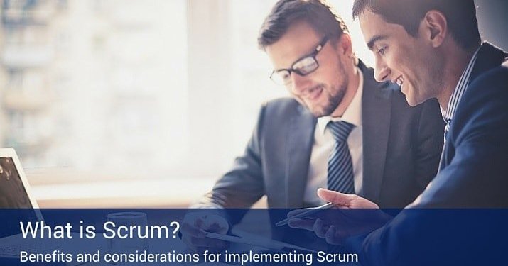 Two businessmen wearing suits and ties are working together looking at a clip board with a banner across bottom of the picture that reads "What is Scrum?" and "Benefits and considerations for implementing scrum".