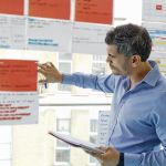 Project manager observes different ways to complete a project